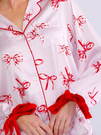 WOMEN'S LONG SLEEVE BUTTON UP FRONT POCKET HIGH-LOW BOW PRINT BLOUSE