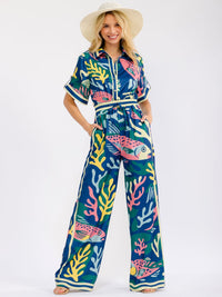 WOMEN'S SHORT SLEEVE BUTTON UP ELASTIC WAIST POCKETS WIDE LEG MULTI PRINT JUMPSUIT