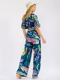WOMEN'S SHORT SLEEVE BUTTON UP ELASTIC WAIST POCKETS WIDE LEG MULTI PRINT JUMPSUIT