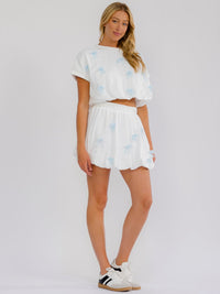 WOMEN'S ELASTIC WAIST BOWS LACE DETAILED BUBBLE HEM MINI SKIRT