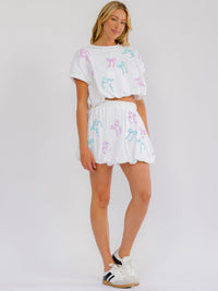 WOMEN'S SHORT SLEEVE SEQUINS BOWS DETAILED BUBBLE BOTTOM HEM TOP