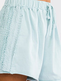 WOMEN'S ELASTIC WAIST SELF TIE LACE DETAILED MINI SHORTS