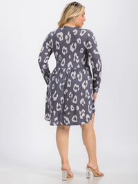 PLUS SIZE LONG SLEEVE ELASTIC WAIST FRONT POCKETS ANIMAL PRINT MINI DRESS