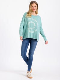 WOMEN'S LONG SLEEVE GRAPHIC WASHED TOP