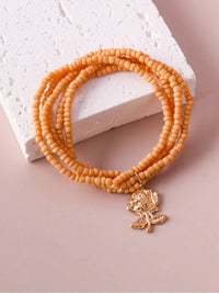WOMEN'S FASHION ASSORTED COLORS BEADS FLOWER BRACELET