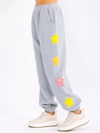 WOMEN'S ELASTIC WAIST FRONT POCKET SEQUINS STARS DETAILED SWEATPANTS