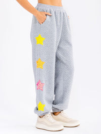 WOMEN'S ELASTIC WAIST FRONT POCKET SEQUINS STARS DETAILED SWEATPANTS