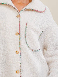 WOMEN'S LONG SLEEVE BUTTON CLOSURE FRONT POCKET FLORAL SHERPA JACKET