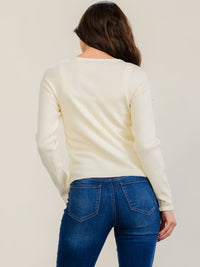 WOMEN'S LONG SLEEVE FRONT SLIT PEARL BOW DETAILED PULLOVER SWEATER