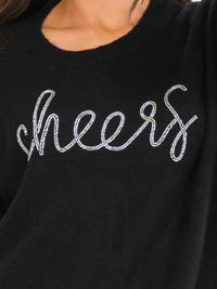 WOMEN'S LONG SLEEVE CHEERS PRINT PULLOVER SWEATER