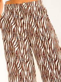 WOMEN'S BUTTON CLOSURE ELASTIC WAIST FRONT POCKETS PRINT WIDE LEG PANTS