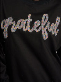 WOMEN'S LONG SLEEVE GRAPHIC PULLOVER SWEATER