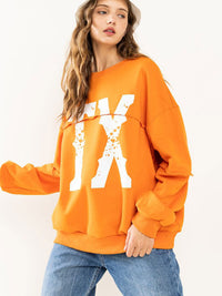 WOMEN'S LONG SLEEVE GRAPHIC PULLOVER SWEATER