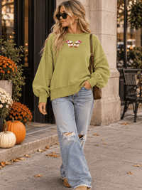 WOMEN'S LONG SLEEVE GRAPHIC PULLOVER SWEATER