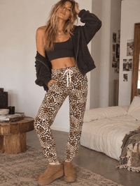 WOMEN'S ELASTIC WAIST SELF TIE FRONT POCKETS DISTRESS ANIMAL PRINT JOGGER PANTS