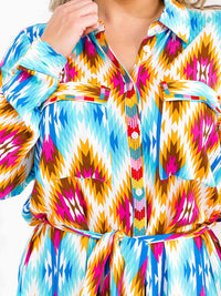 PLUS SIZE LONG SLEEVE BUTTON UP SELG TIE FRONT POCKETS MULTI PRINT MAXI DRESS