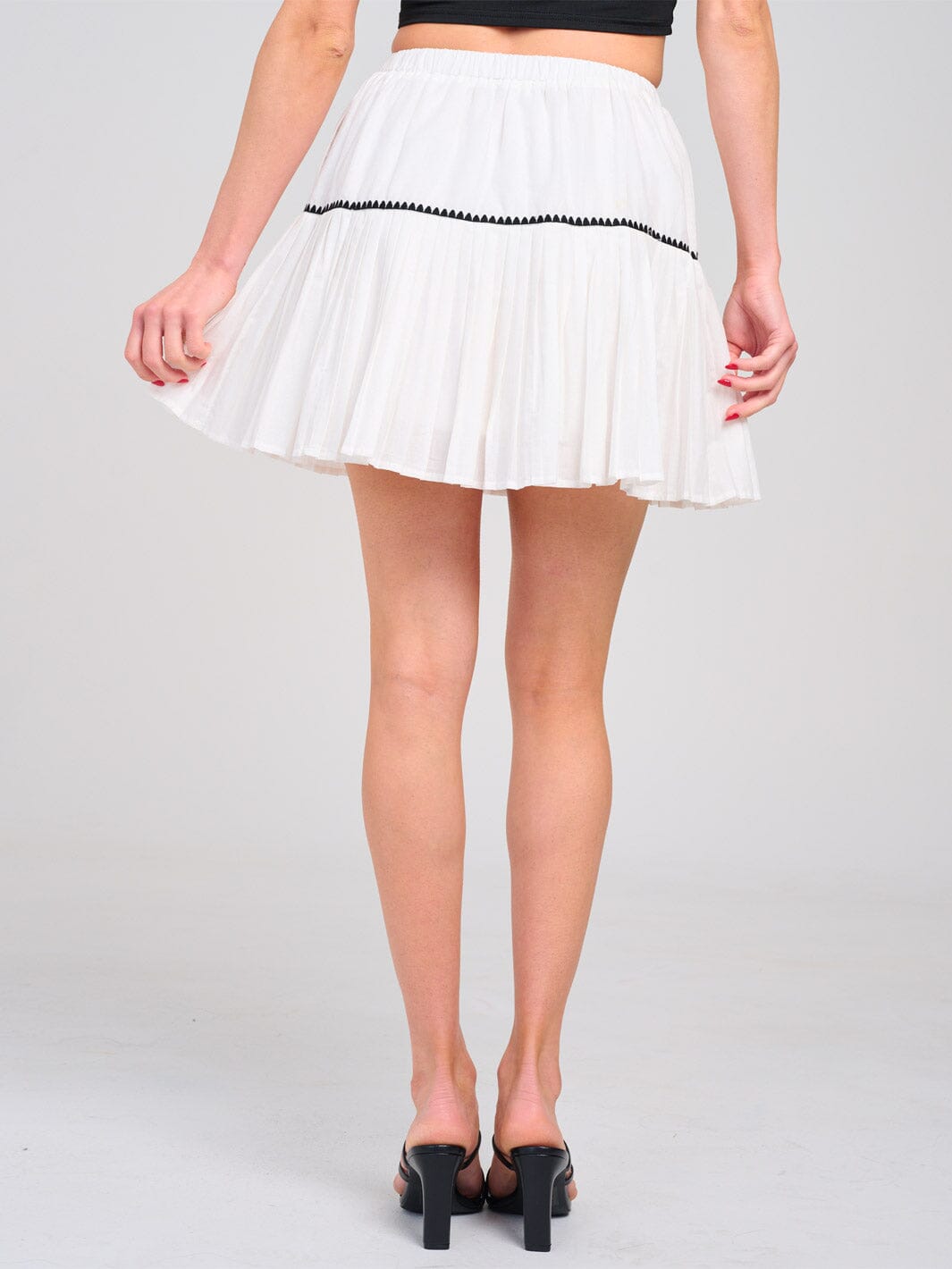 WOMEN'S ELASTIC WAIST PLEATED FLARE MINI SKIRT