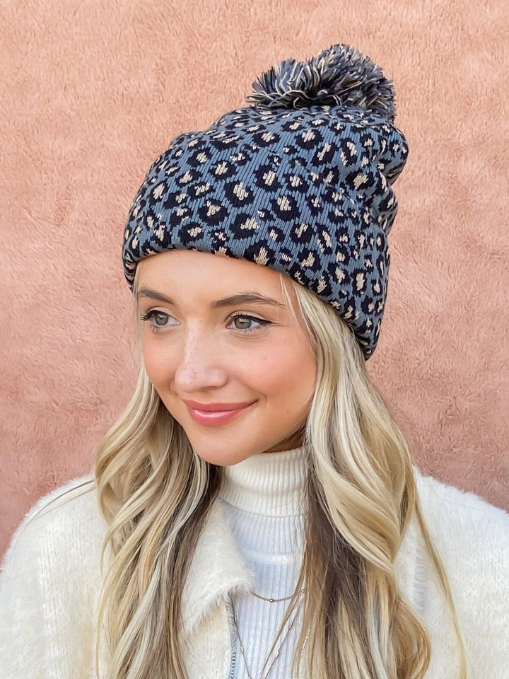 WOMEN'S ANIMAL PRINT FAUX FUR POM POM BEANIE