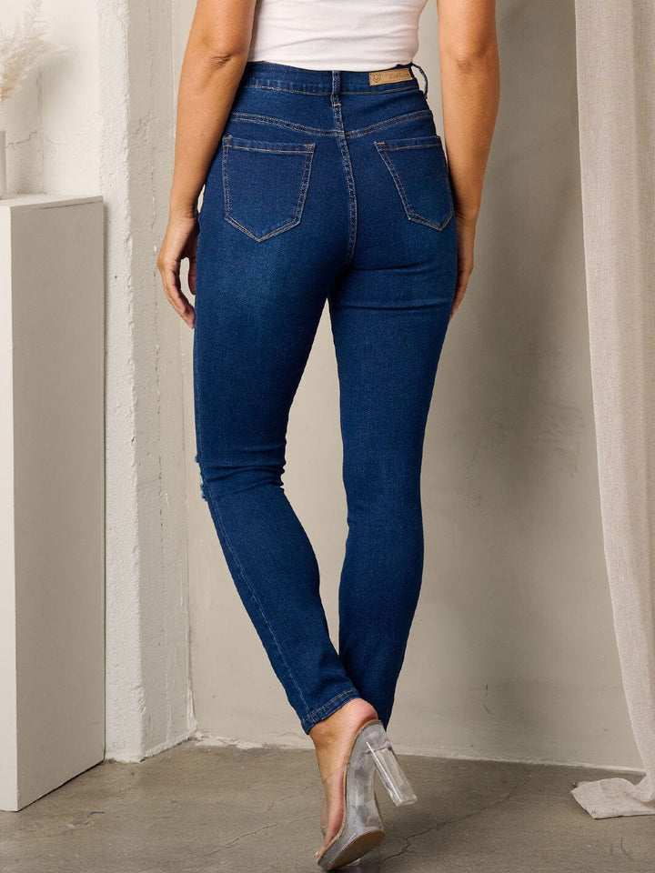 WOMEN'S BUTTON CLOSURE DISTRESSED SKINNY JEANS