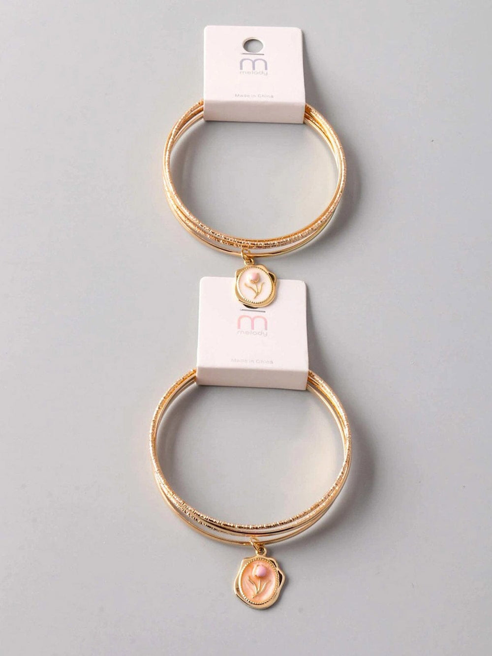 FASHION MULTI PENDANT FLOWER BRACELET