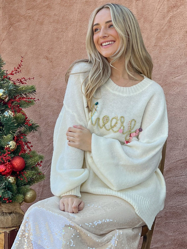 WOMEN'S LONG SLEEVE GRAPHIC PULLOVER SWEATER