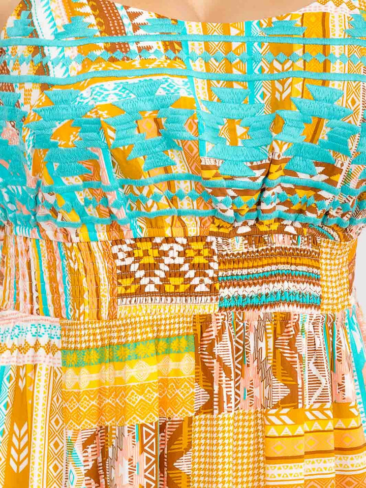 PLUS SIZE SLEEVELESS SMOCK WAIST MULTI PRINT MINI DRESS