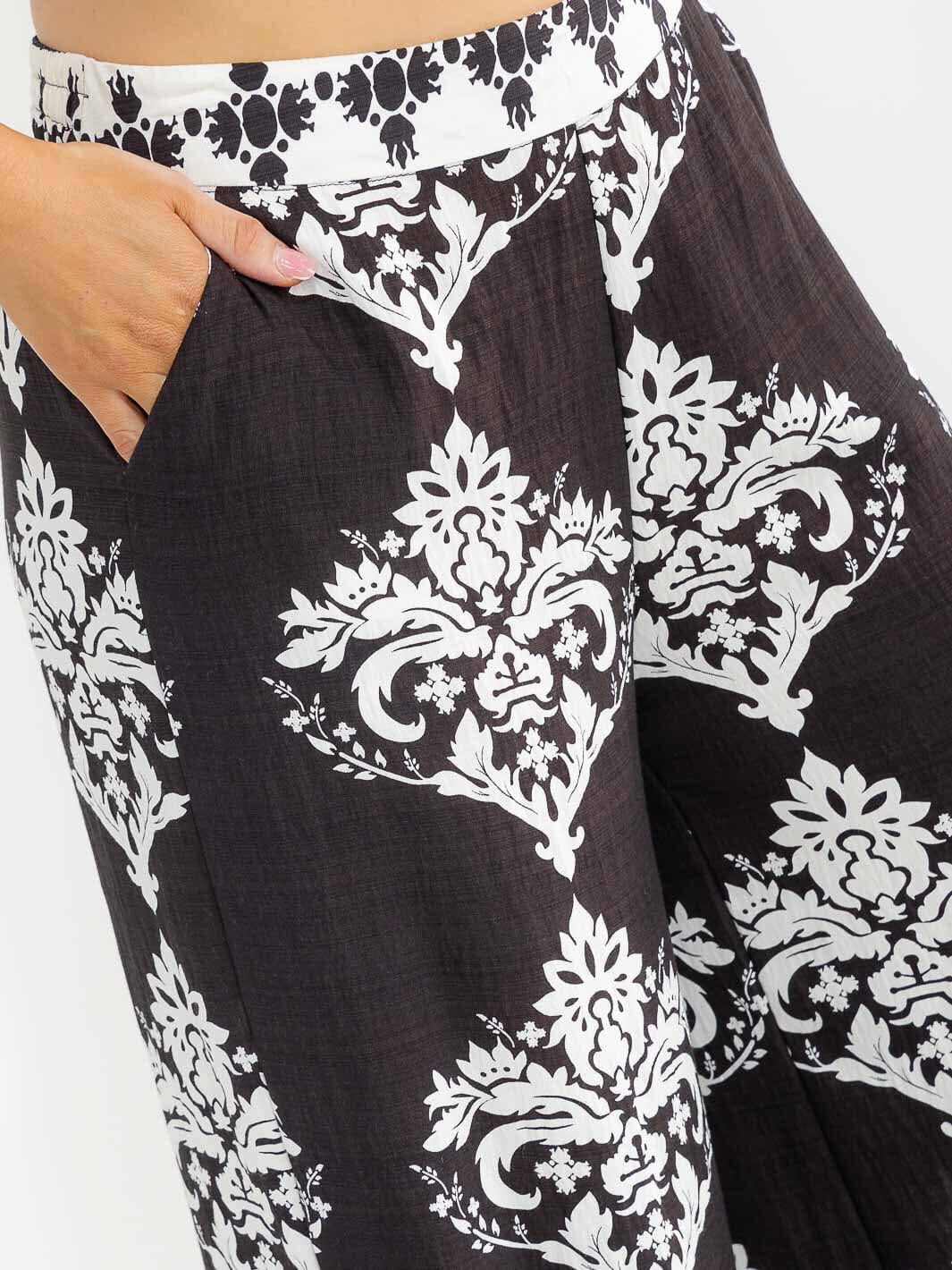 PLUS SIZE ELASTIC WAIST FRONT POCKETS WIDE LEG PALAZZO PRINT PANTS