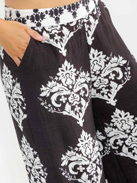 PLUS SIZE ELASTIC WAIST FRONT POCKETS WIDE LEG PALAZZO PRINT PANTS