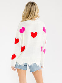 WOMEN'S LONG SLEEVE V-NECK HEART KNIT RAW EDGE PULLOVER SWEATER