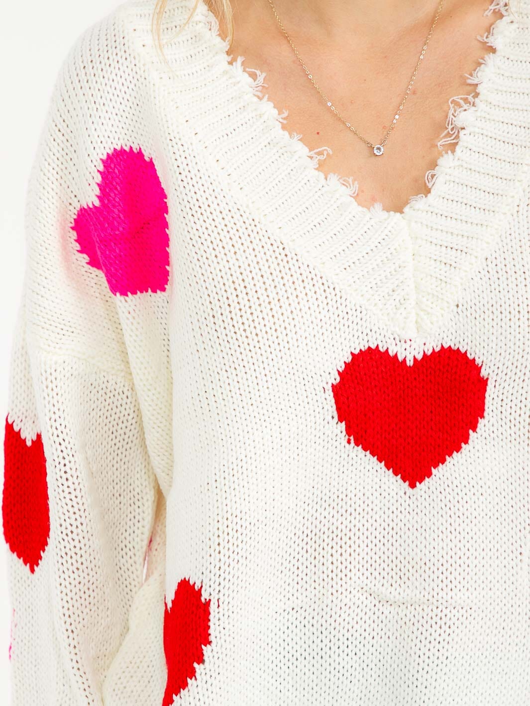WOMEN'S LONG SLEEVE V-NECK HEART KNIT RAW EDGE PULLOVER SWEATER