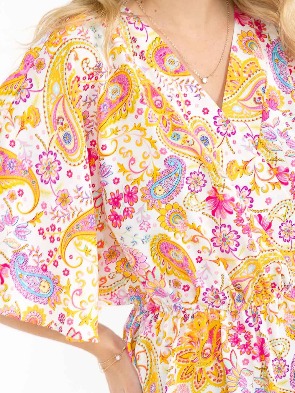 WOMEN'S SHORT SLEEVE SURPLICE ELASTIC WAIST MULTI PRINT BLOUSE