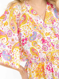 WOMEN'S SHORT SLEEVE SURPLICE ELASTIC WAIST MULTI PRINT BLOUSE