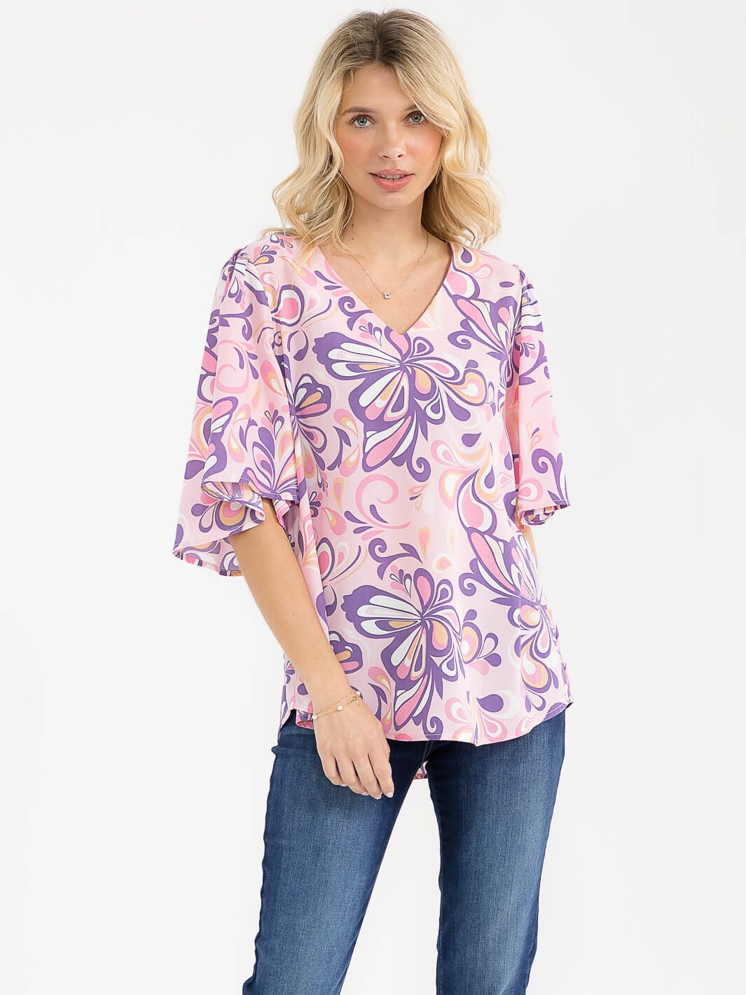 WOMEN'S SHORT SLEEVE V-NECK MULTI PRINT BLOUSE