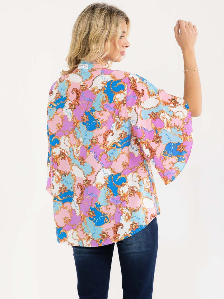 WOMEN'S SHORT BELL SLEEVE V-NECK MULTI PRINT BLOUSE