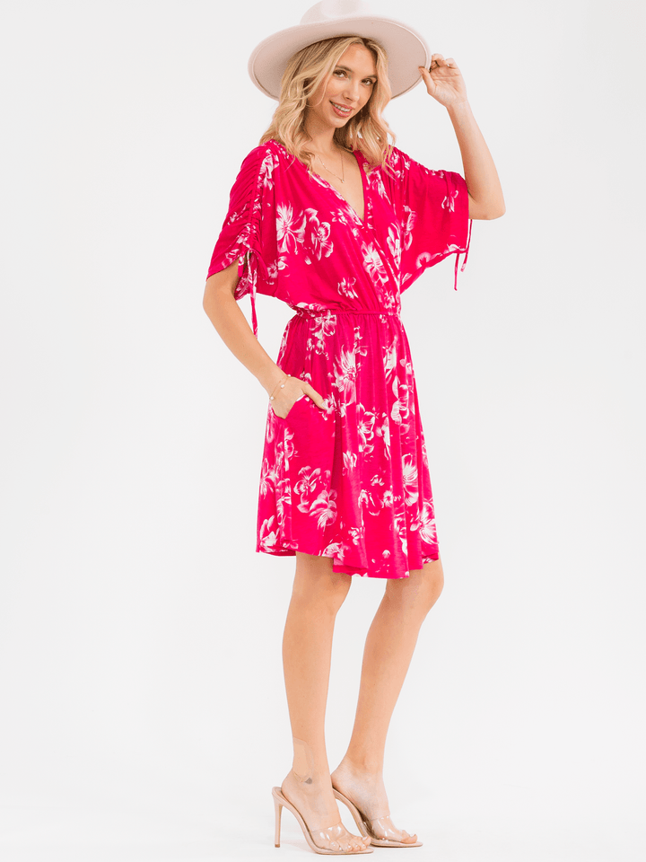 WOMEN'S SHORT SLEEVE SURPLICE ELASTIC WAIST POCKETS FLORAL PRINT MINI DRESS