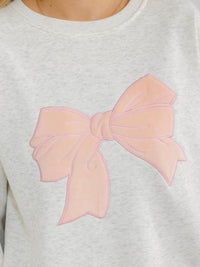 WOMEN'S LONG SLEEVE BOW DETAILED PULLOVER SWEATER
