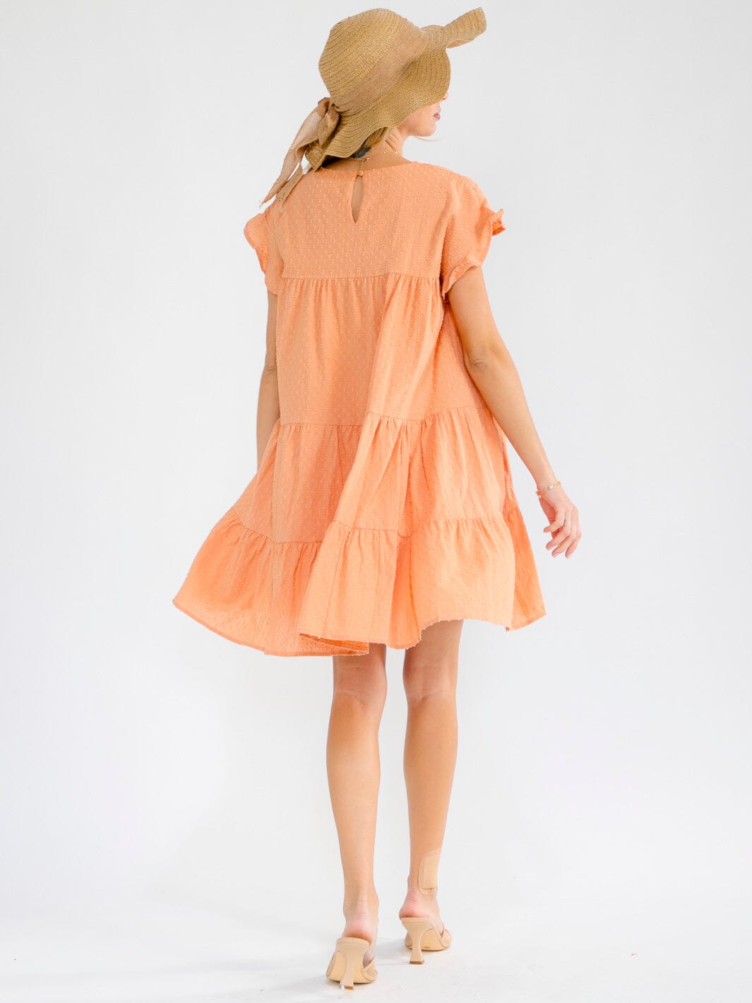 WOMEN'S SHORT SLEEVE TIERED LOOSE FIT TUNIC MINI DRESS Wholesalefashiontrends.com WOMEN'S SHORT SLEEVE TIERED LOOSE FIT TUNIC MINI DRESS Wholesalefashiontrends.com