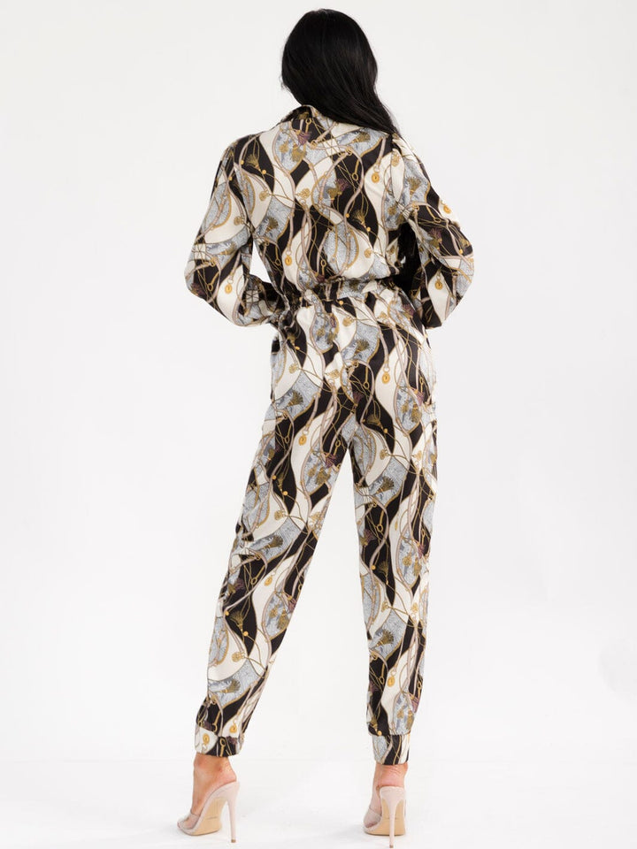 WOMEN'S LONG SLEEVE SURPLICE ELASTIC WAIST POCKETS MULTI PRINT JOGGER JUMPSUIT