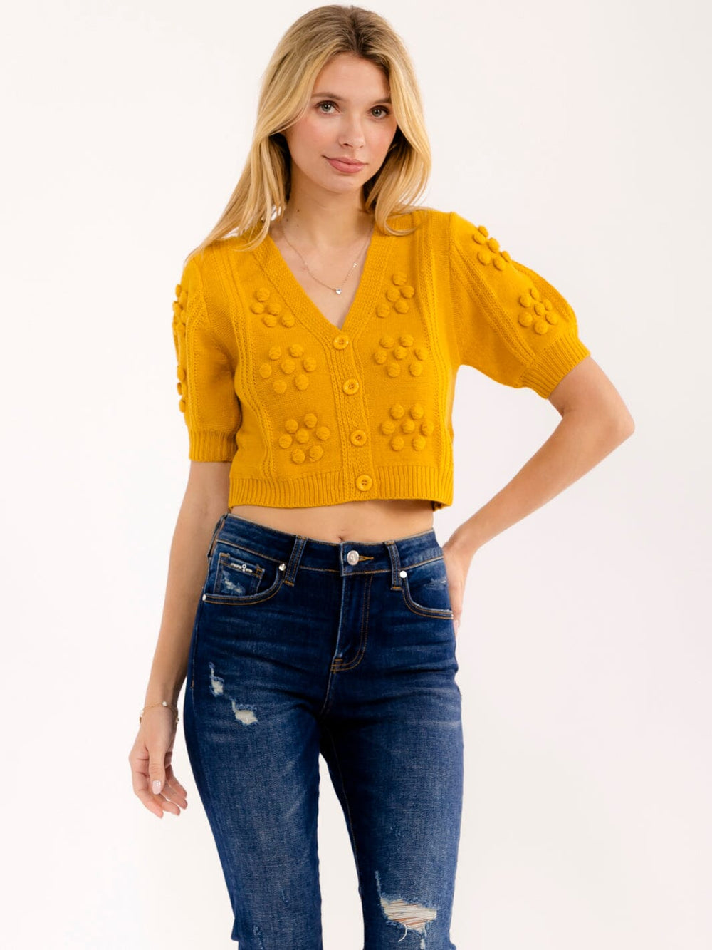 WOMEN'S SHORT SLEEVE BUTTON UP V-NECK POM POM DETAILED SWEATER TOP