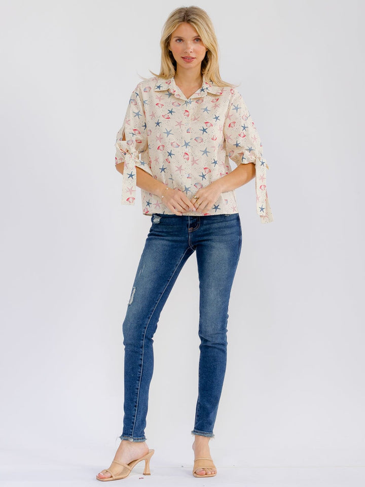 WOMEN'S SHORT SLEEVE BUTTON UP MULTI PRINT BLOUSE