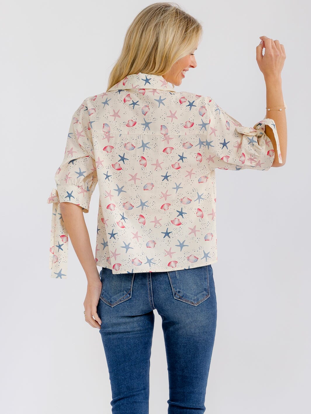 WOMEN'S SHORT SLEEVE BUTTON UP MULTI PRINT BLOUSE