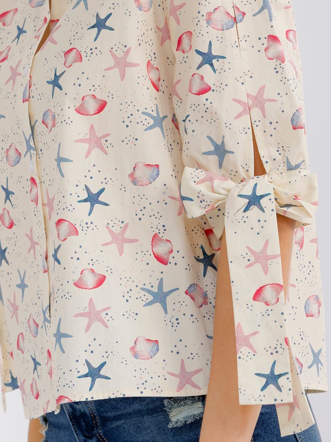WOMEN'S SHORT SLEEVE BUTTON UP MULTI PRINT BLOUSE