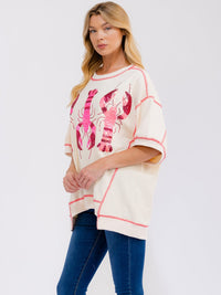 WOMEN'S SHORT SLEEVE SEQUINS GRAPHIC HIGH-LOW OVERSIZED SHIRT