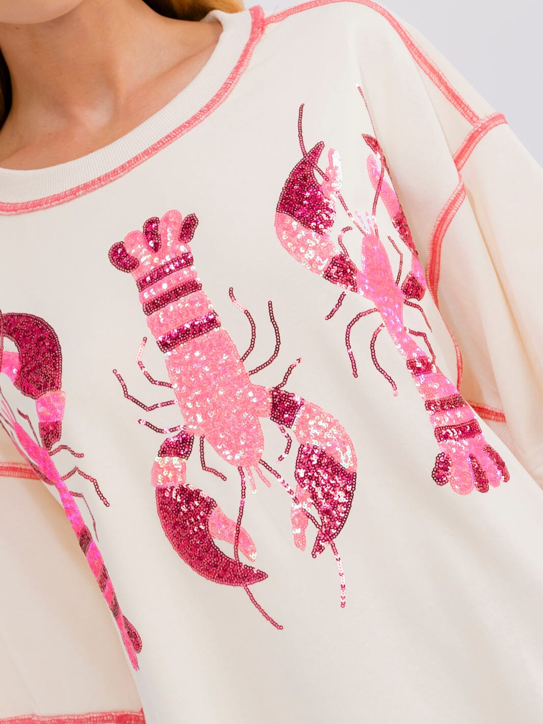 WOMEN'S SHORT SLEEVE SEQUINS GRAPHIC HIGH-LOW OVERSIZED SHIRT