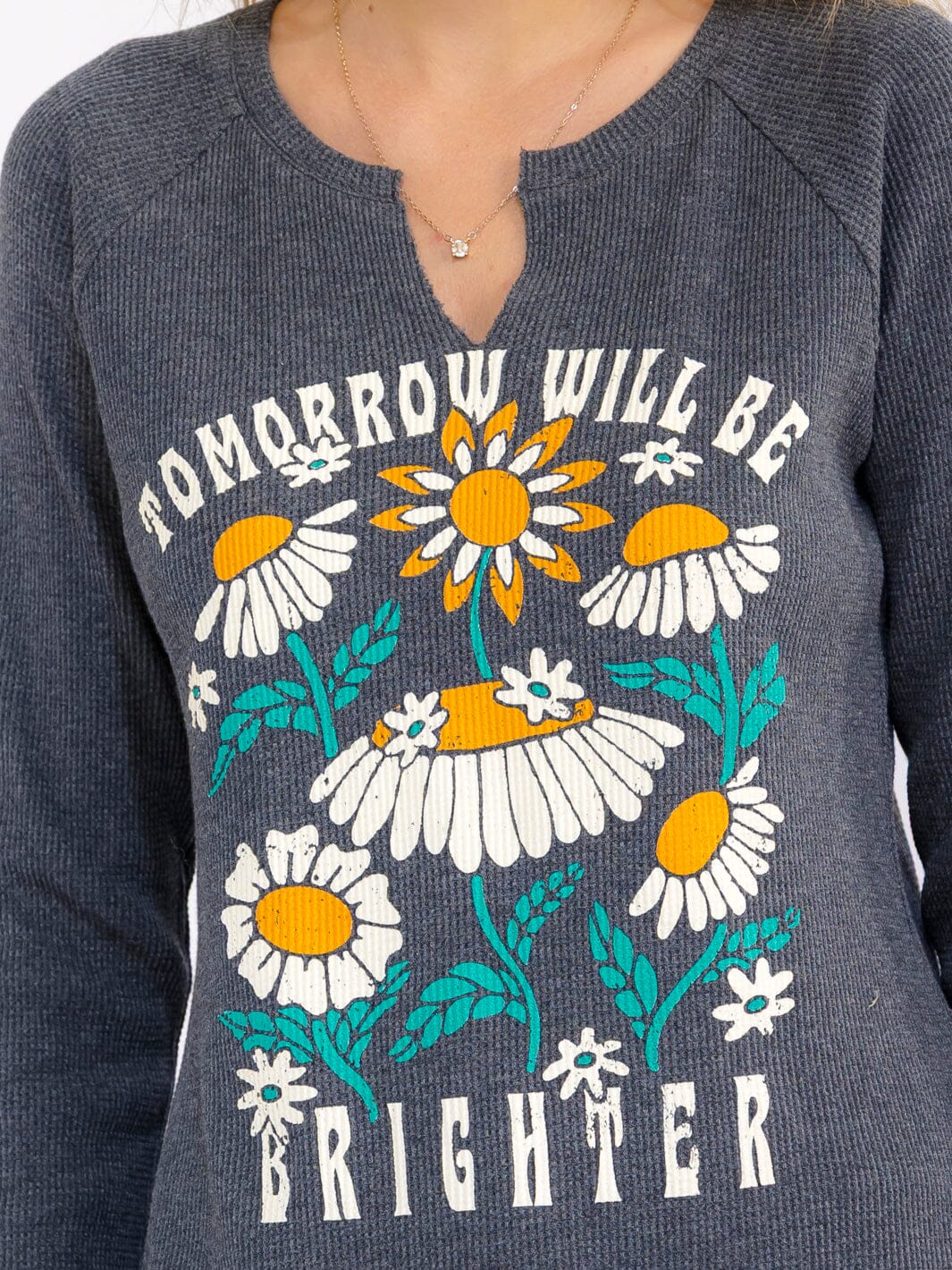 WOMEN'S LONG SLEEVE V-NECK GRAPHIC TOP