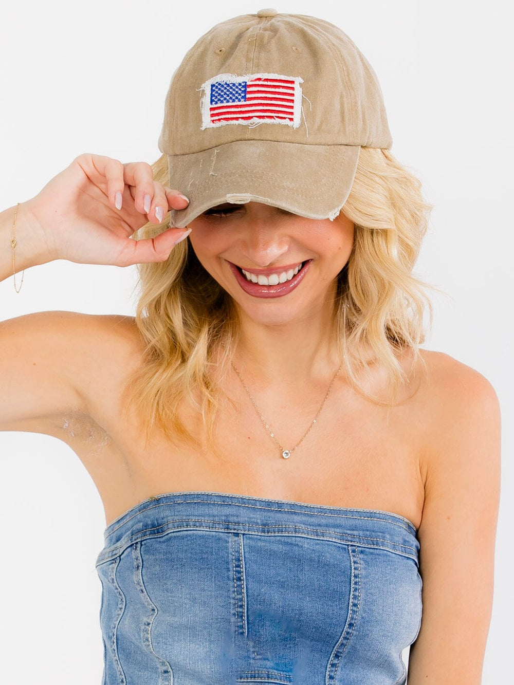 WOMEN'S ASSORTED COLORS ADJUSTABLE STRAP USA DISTRESS PONYTAIL SLOT HATS