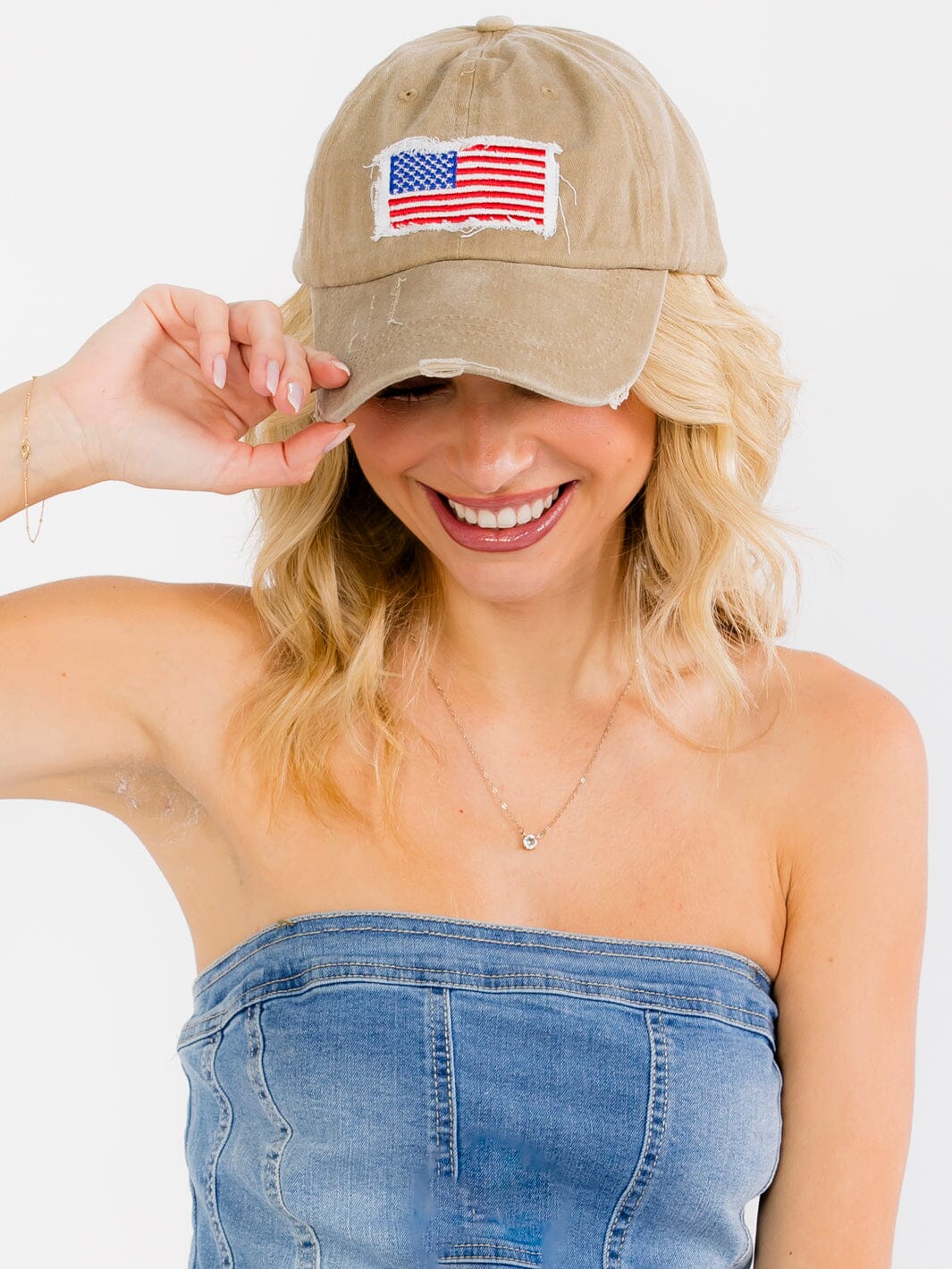 WOMEN'S ASSORTED COLORS ADJUSTABLE STRAP USA DISTRESS PONYTAIL SLOT HATS
