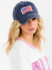 WOMEN'S ASSORTED COLORS ADJUSTABLE STRAP USA DISTRESS PONYTAIL SLOT HATS