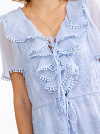 JUST ME WOMEN'S SHORT SLEEVE V-NECK RUFFLE LACE UP ROMPER