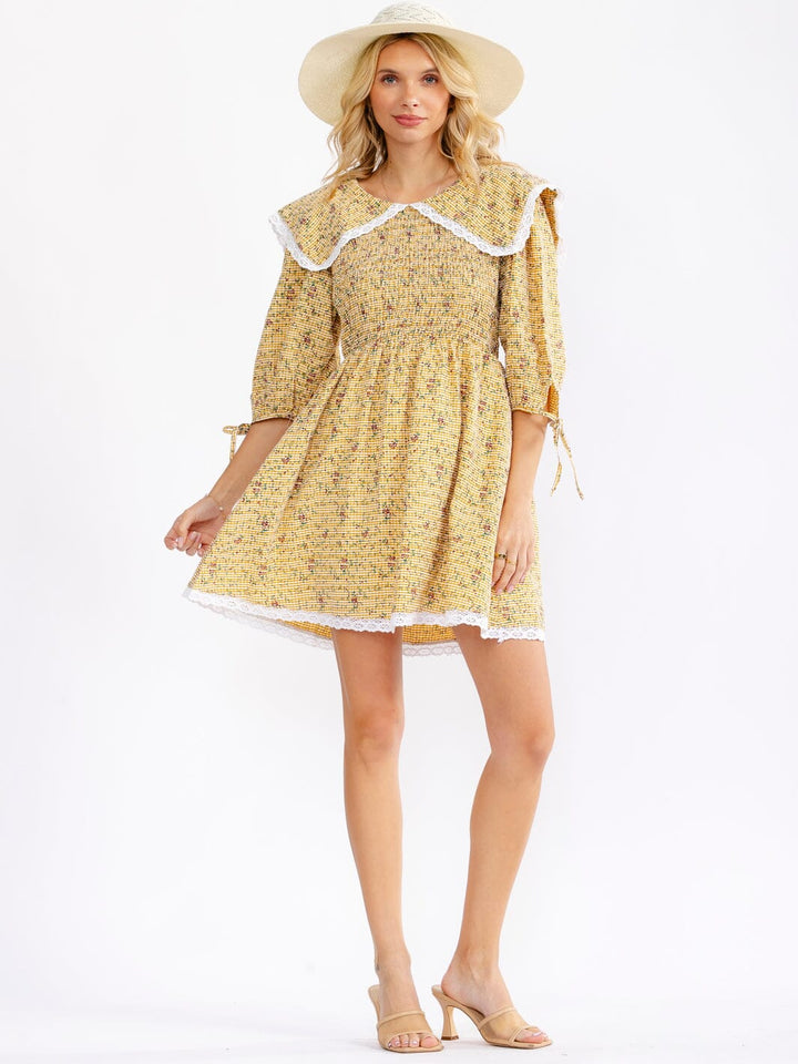 JUST ME WOMEN'S 3/4 PUFF SLEEVE FRONT POCKETS SMOCK FIT & FLARE FLORAL MINI DRESS